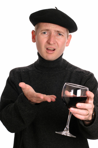 Wine snob protests the unacceptable swill in his glass