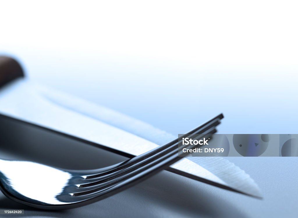Dinner Time Steak knife and fork. Shot with shallow depth of field Close-up Stock Photo
