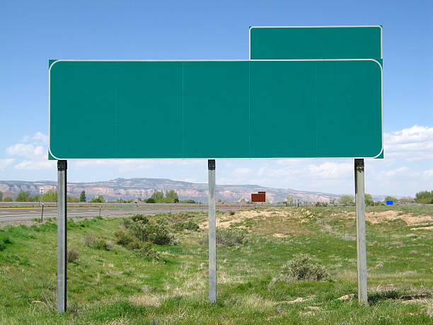 istock Straight-on Centered View of a Green Blank Highway Exit Sign 172642450