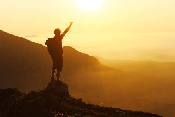 istock Person hiking at sunset 1726431123