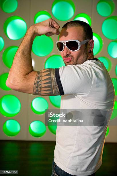 Man Showing Strong Tattoed Arm Stock Photo - Download Image Now - Adult, Anaerobic Exercise, Body Building