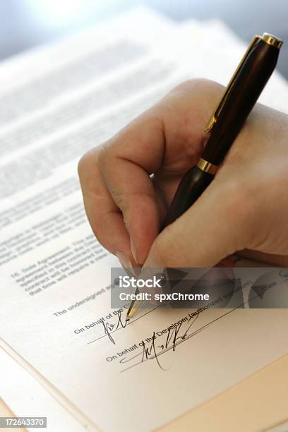 Signing Contract Stock Photo - Download Image Now - Contract, Signing, Agreement