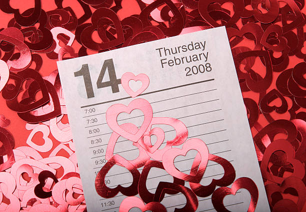 istock February 14 Calendar Page with Red Hearts 172643475