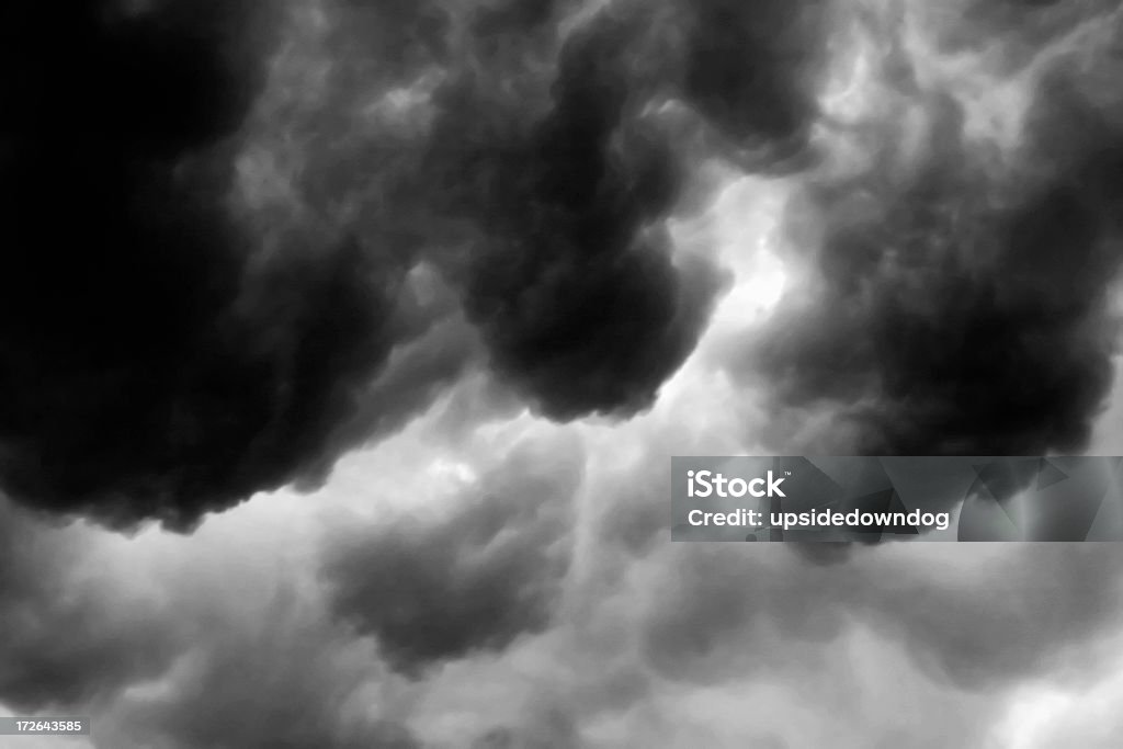 Storm Cloud Series #3 of 6 "Dark and evil looking storm clouds. Taken at the onset of a massive storm here in Pensacola, Florida. These clouds were swirling and building at incredible speed, looking more like smoke or coffee swirling with cream.See other cloud shots in this series" Aura Stock Photo