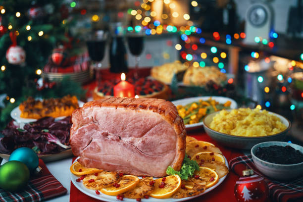 Christmas Dinner with Baked Glazed Ham and Various Vegetables