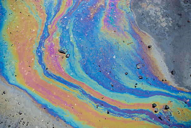 нефть slick - oil slick фотографии стоковые фото и изображения