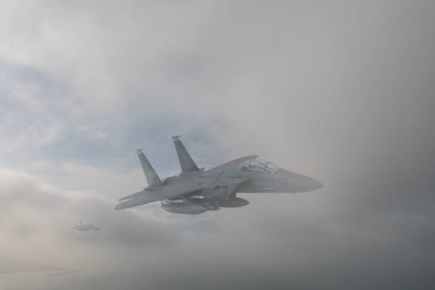 istock Jet aircrafts flying over the clouds. 1726452617