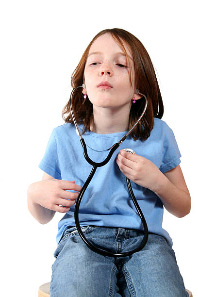 Cheerful doctor using stethoscope.