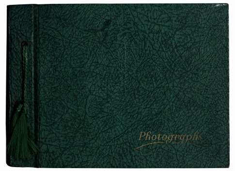 old photo album cover with green leather texture cover