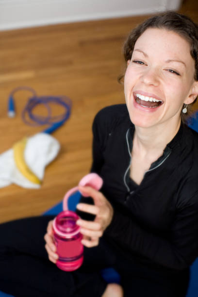 istock cute girl laughing after workout 172645947