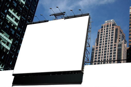 Blank white banner for advertisement on the fence of construction site