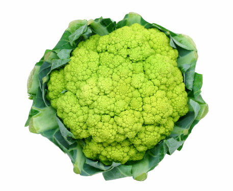 This is a green variety of cauliflower. Isolated on white.