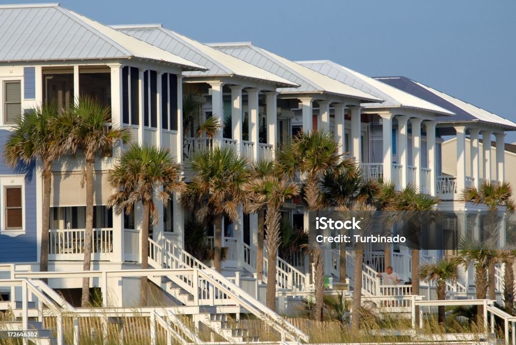 Fila di case in spiaggia - Foto stock royalty-free di Aspirazione