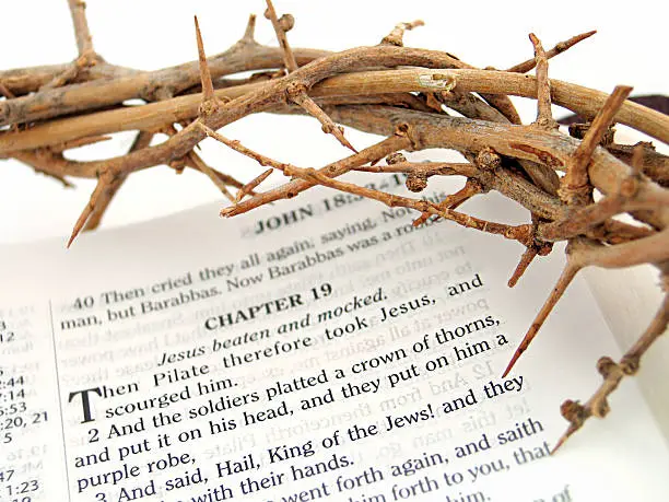 A real crown of thorns from the Holy Land on a King James Version Bible open to John 19 (where it mentions the crown of thorns being put on the head of Jesus.)