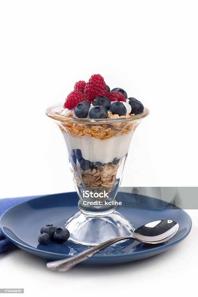 Granola Perfect "A delicious way to enjoy the start of your day with a helping of freshberries, granola drizzled with honey and yogurt.shallow dof" Oats - Food Stock Photo