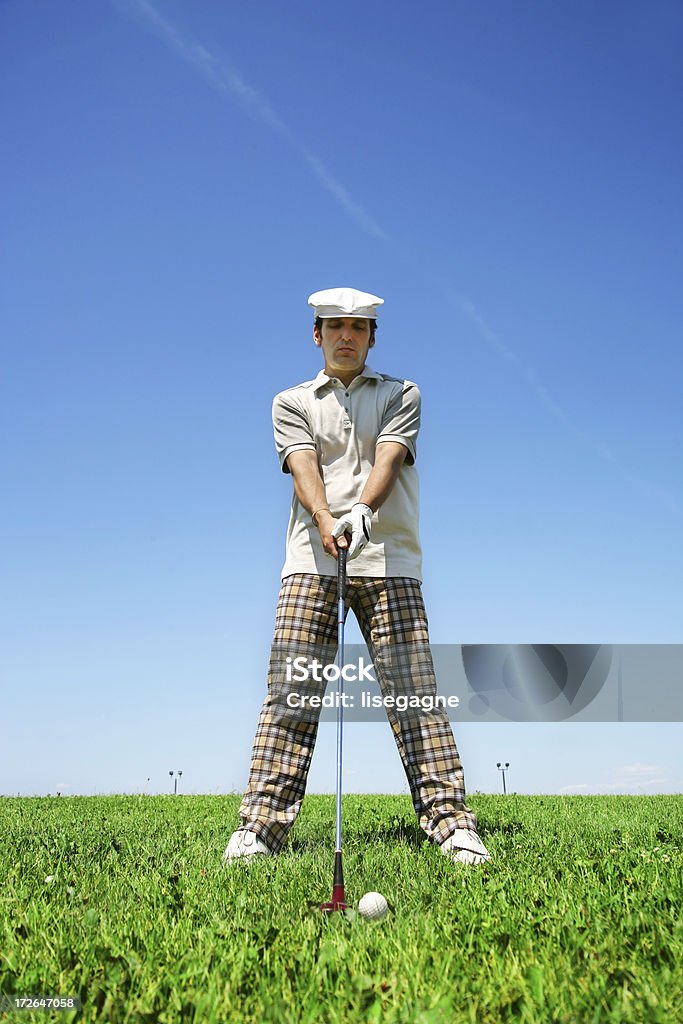 Concentrazione novizio golf - Foto stock royalty-free di Golf