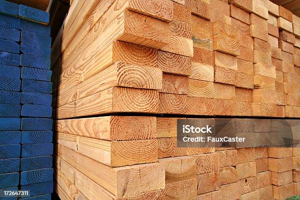 Stacks Of Lumber Stock Photo - Download Image Now - Backgrounds, Blue, Construction Industry