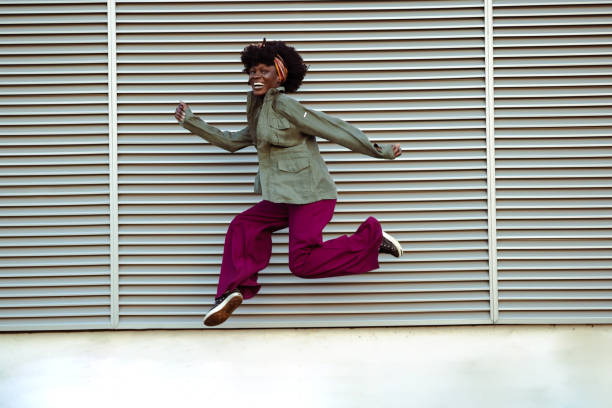 istock African American woman jumping 1726475636