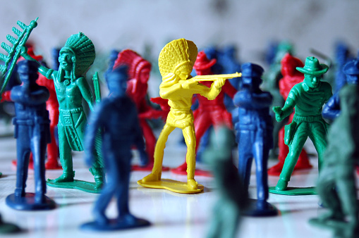 A collection of plastic men in battle.