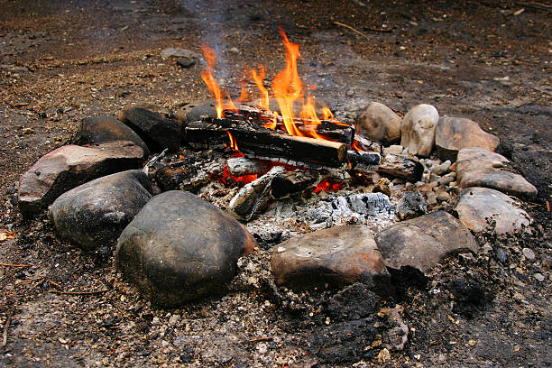 Camp'n Wilderness campfire. Aflame stock pictures, royalty-free photos & images