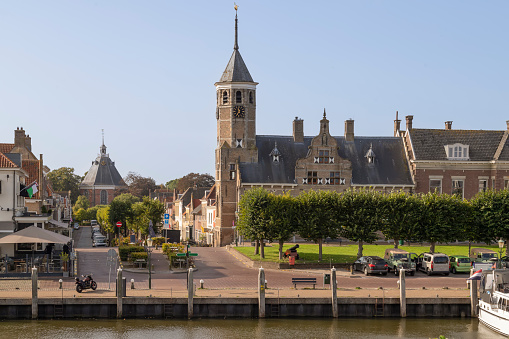 Amsterdam, Netherlands - 04 17 2016: Munttoren is a tower in Amsterdam, the Netherlands. It stands on the busy Muntplein square, where the Amstel river and the Singel canal meet.