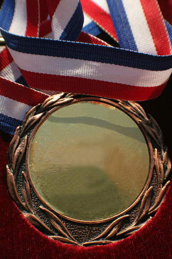 A blank gold medal.