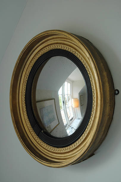 Detail - Circular Mirror Gilt framed circular distorting mirror. convex stock pictures, royalty-free photos & images