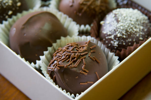 istock Close-up shot of chocolate truffles in a gift box 172648024
