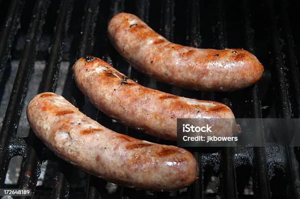 Grilling Brats On The Grill Stock Photo - Download Image Now - Sulking, Barbecue Grill, Sausage