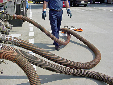 Man pumping gasoline