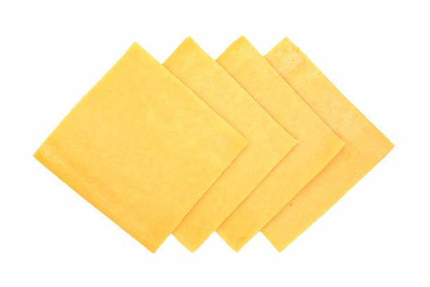cheddar slices stock photo