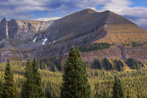 istock Autumn Sheep Mountain and Clouds 1726492669