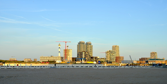 Ostend, West-Flanders, Belgium - October 1, 2023: beautiful wide angle view on canal and towers at the horizon
