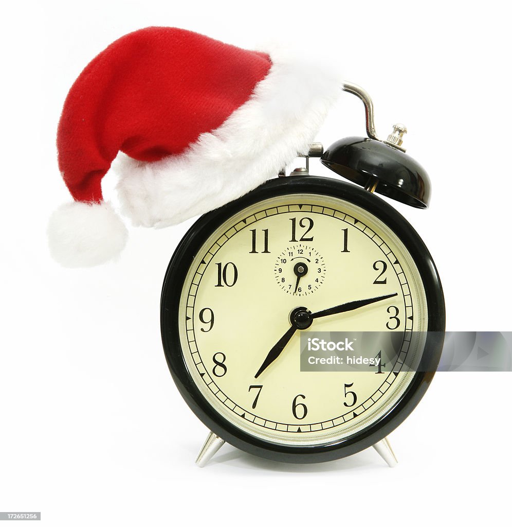 Christmas Time Alarm with Santa Hat Christmas Stock Photo