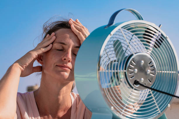istock Woman with Fan 1726514501