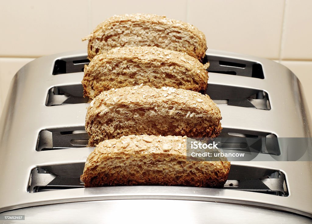 Toast Four slices of toast in a toaster.Similar pictures: Appliance Stock Photo