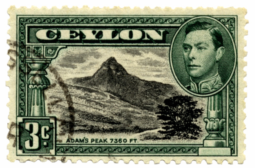 Ceylon postage stamp with king portrait.More British monarchy stamps: