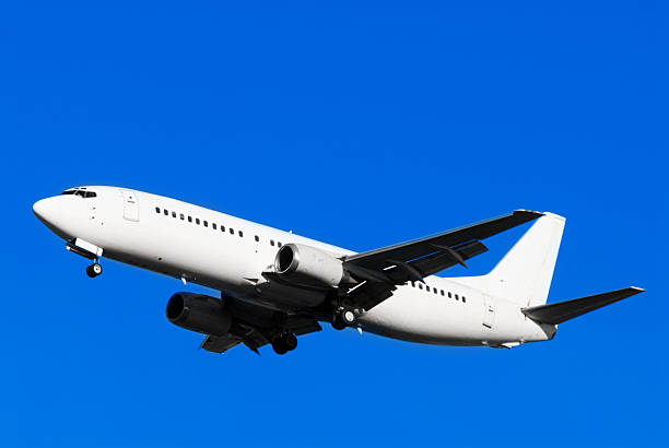 istock Commercial Airliner with Blue Sky 172653186