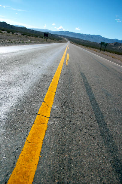 istock road in the alpes 172653987