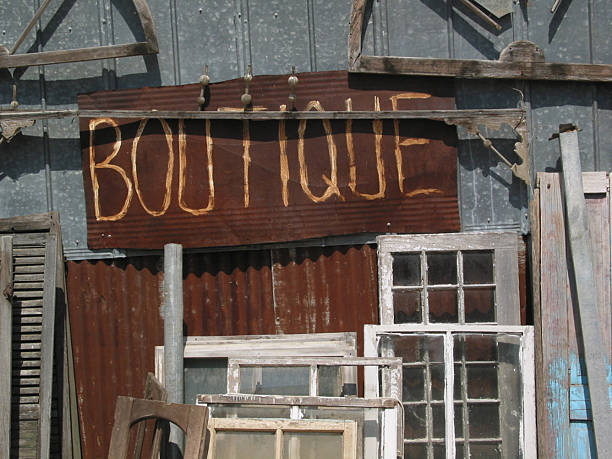 бутик - sign rust old fashioned corrugated iron стоковые фото и изображения