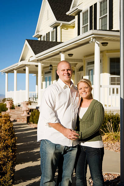 istock Young Couple with New Home 172654630