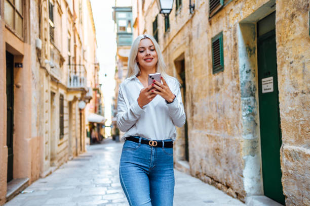 istock Woman using phone in Valletta, Malta 1726548840