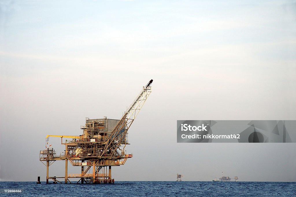 Offshore Oil Rig Oil rig near Dauphin Island. Offshore Platform Stock Photo