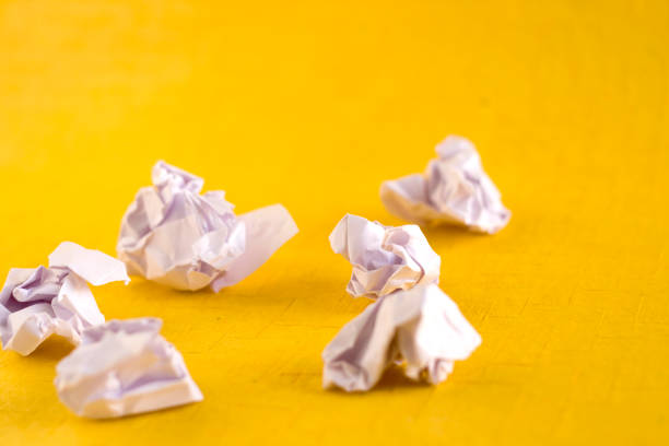 istock Pieces of Crushed crumpled papers while Brain Storming for ideas 172656976