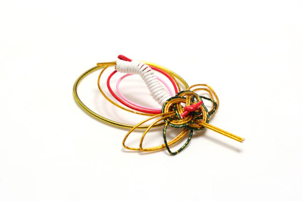 Decorative Japanese cord made from twisted paper isolated a white background.