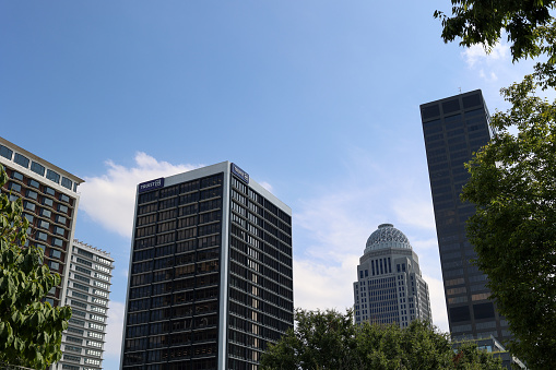 Louisville, Kentucky USA September 1, 2023: A view of the Trust  Bank building in downtown Louisville, Kentucky against a blue sky