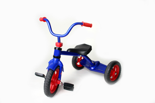 Blue tricycle on a white background.
