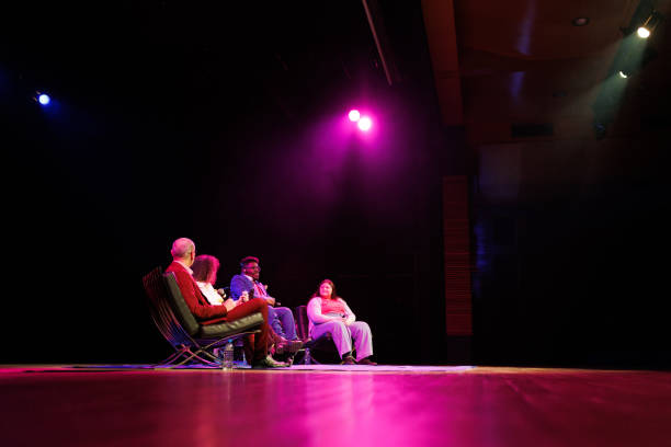 istock Group of people giving a lecture during a technology convention 1726578593