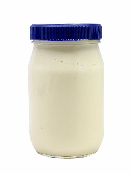 jar of mayonnaise "A jar of mayonnaise, isolated on white." mayonnaise photos stock pictures, royalty-free photos & images