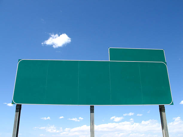 istock Upward Centered View of a Green Blank Highway Exit Sign 172658322
